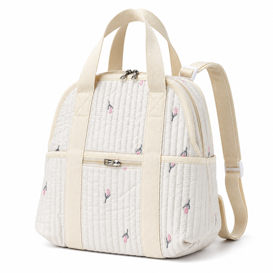Quilted floral baby diaper backpack straight front view
