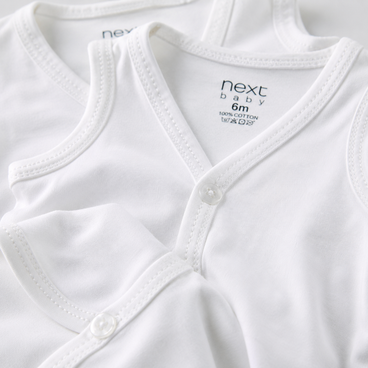 Next Baby Vest Pack of 3 – Plain White Soft Cotton Bodysuits | 0–9 Months