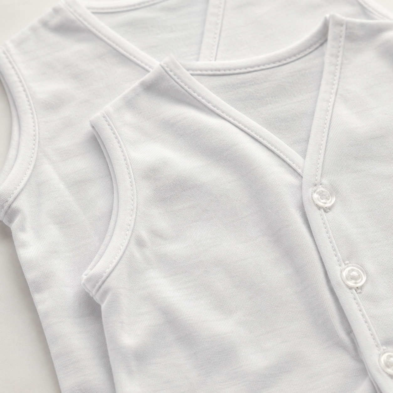 Baby Vest Pack of 3 – Premium White Cotton Bodysuits | 0–9 Months