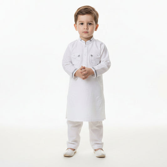 Child wearing a white traditional outfit on a white background
