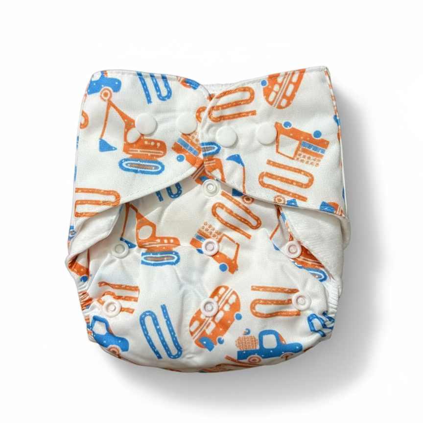 White diaper with orange and blue patterns on a brown background