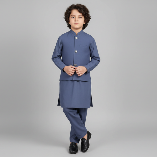 Child wearing a blue traditional outfit on a gray background