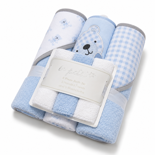 Baby towel and washcloth gift set in pink whale design on white background
