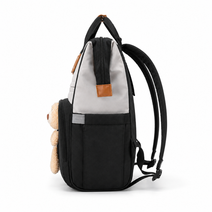 Black baby diaper backpack side profile product photo on white background