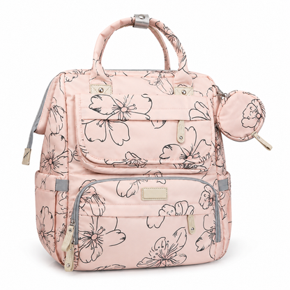 Blush pink floral mother and baby diaper backpack front three-quarter view with accessory pouch