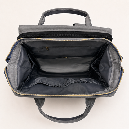 Empty organized interior of charcoal grey mother and baby backpack