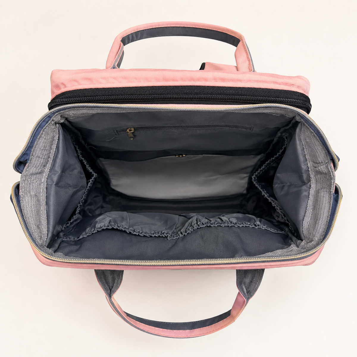 Spacious organized interior of mother and baby backpack