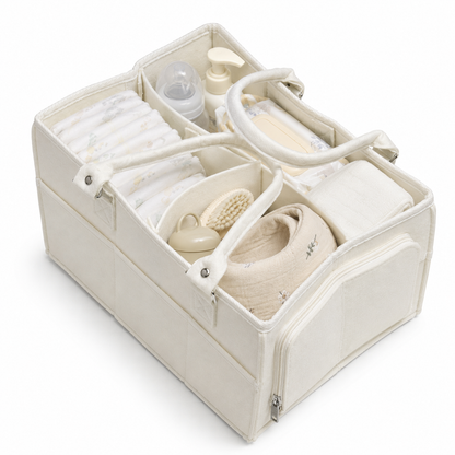 Ivory felt baby diaper caddy organizer filled with baby essentials