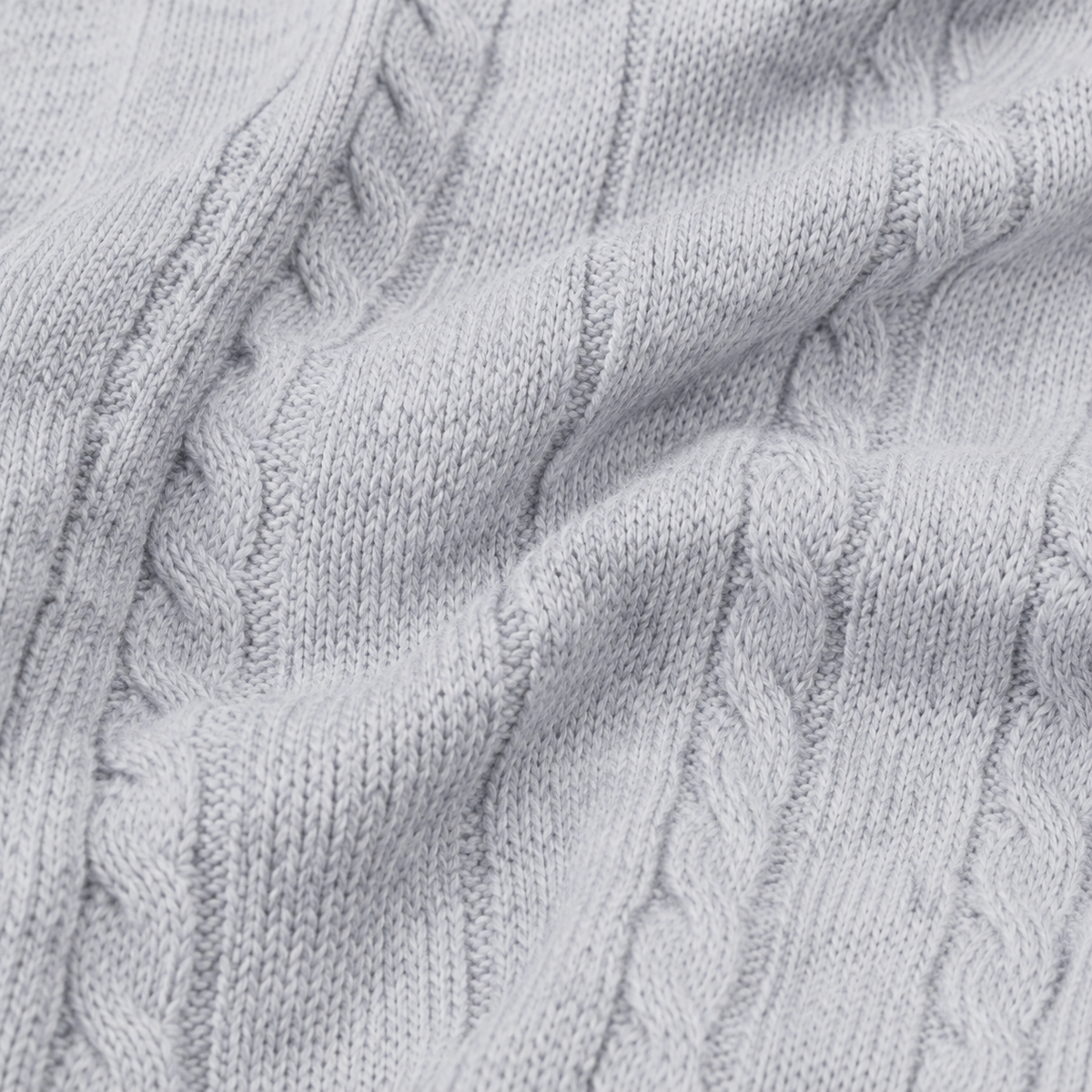 Gray cable knit baby romper fabric texture close-up