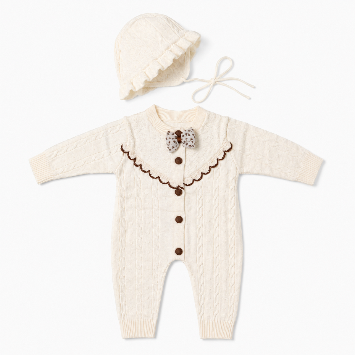 Ivory cable knit baby romper set with matching bonnet front hero view
