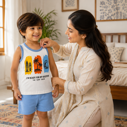 Mother helping child wearing kids vacation surf sleeveless shirt and shorts set