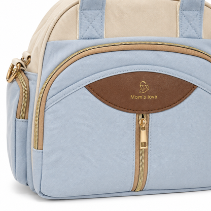 Mom’s Love blue and cream baby diaper carry bag logo and zipper closeup