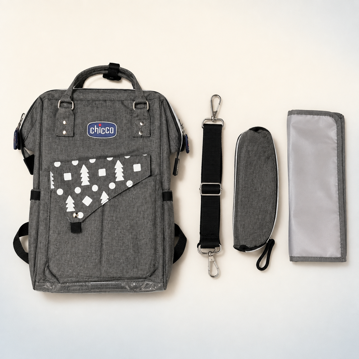 Backpack with shoulder strap bottle pouch and changing mat