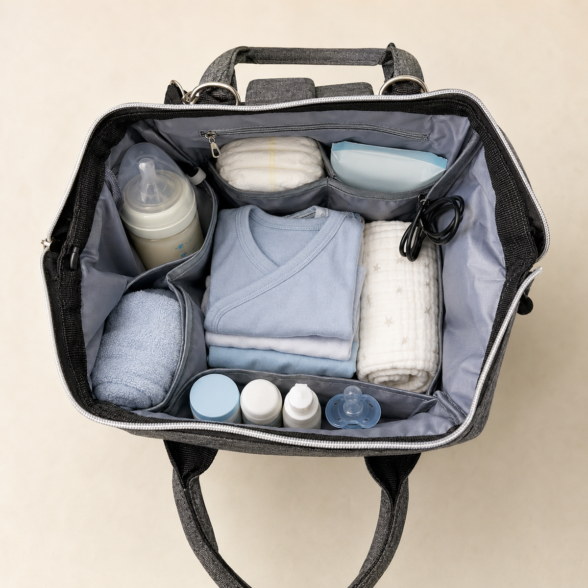 Organised mother and baby essentials inside backpack