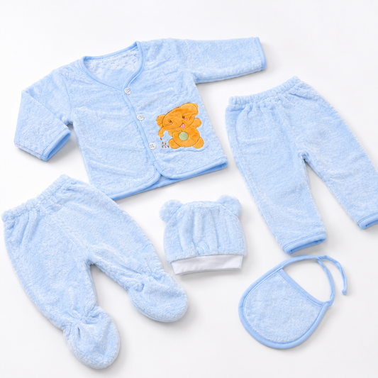 Blue newborn plush baby clothing set angled flat lay product photo