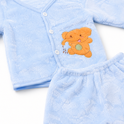 Blue newborn plush baby clothing set teddy applique close-up photo