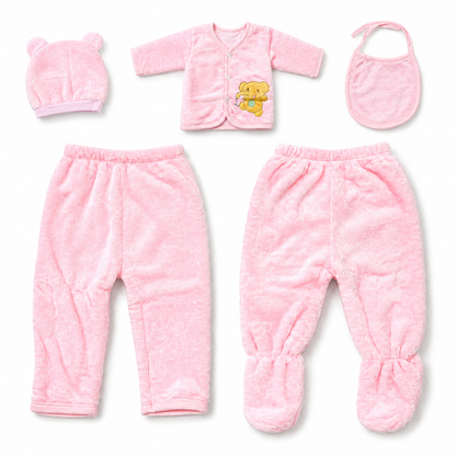 Pink newborn plush baby clothing set angled flat lay product photo