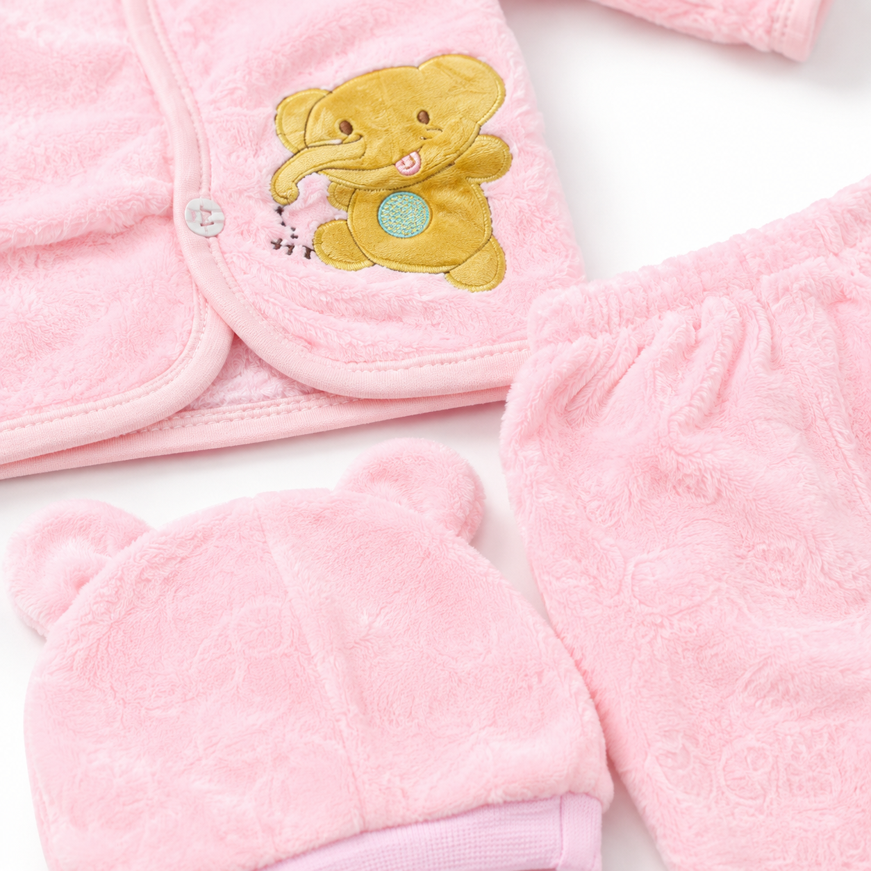Pink newborn plush baby clothing set close grouping product photo