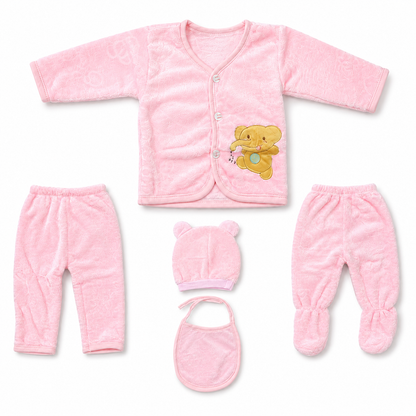 Pink newborn plush baby clothing set organized component flat lay