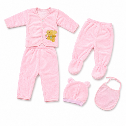Pink newborn plush baby clothing set clean catalog flat lay