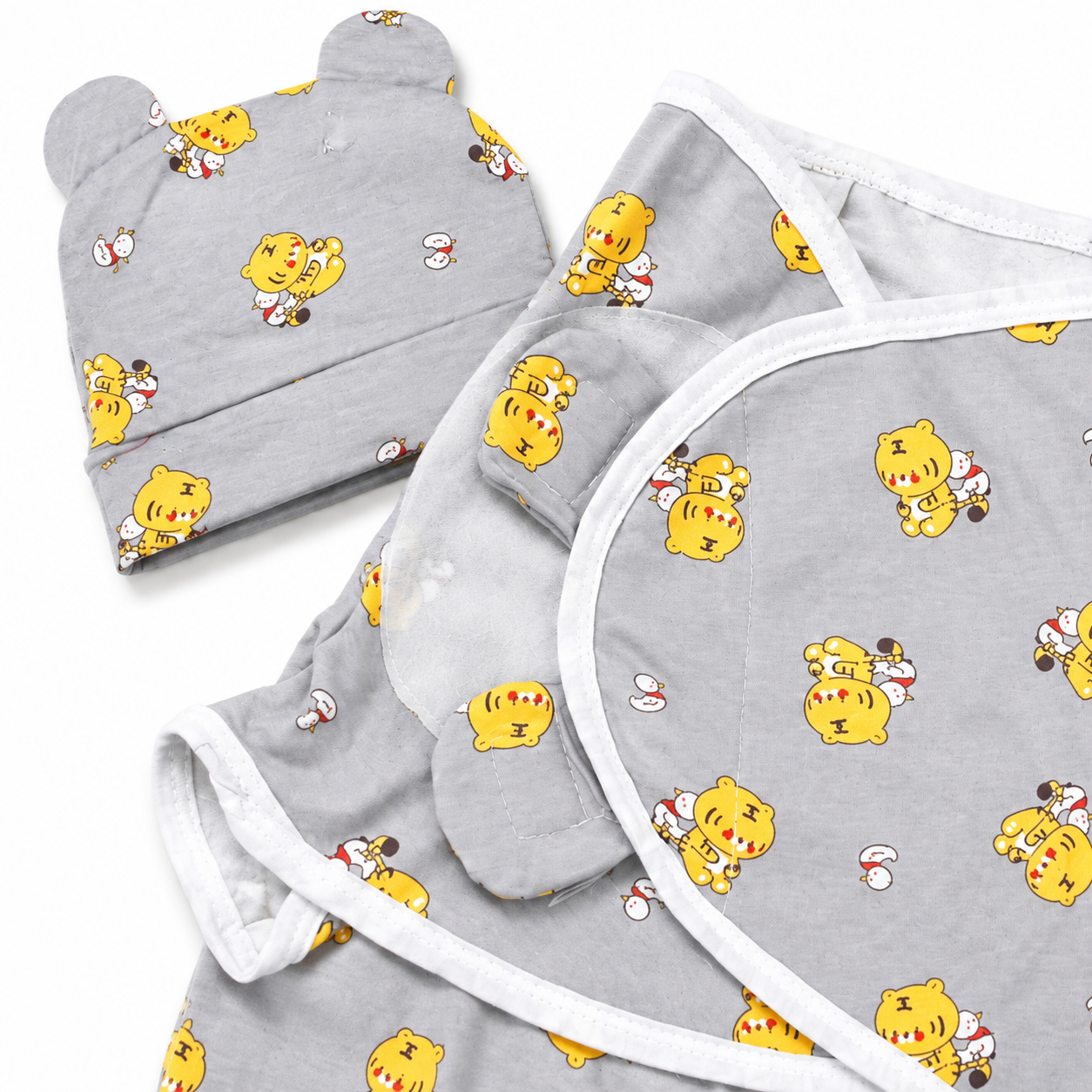 Front view newborn baby swaddle wrap with matching cap grey tiger print on white background