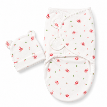 Newborn baby swaddle wrap with matching cap pink bunny print hero product photo on white background
