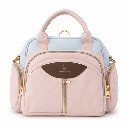 Pastel pink and blue baby diaper carry bag angled product photo