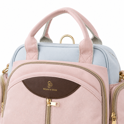 Pastel pink and blue baby diaper carry bag zipper and logo detail