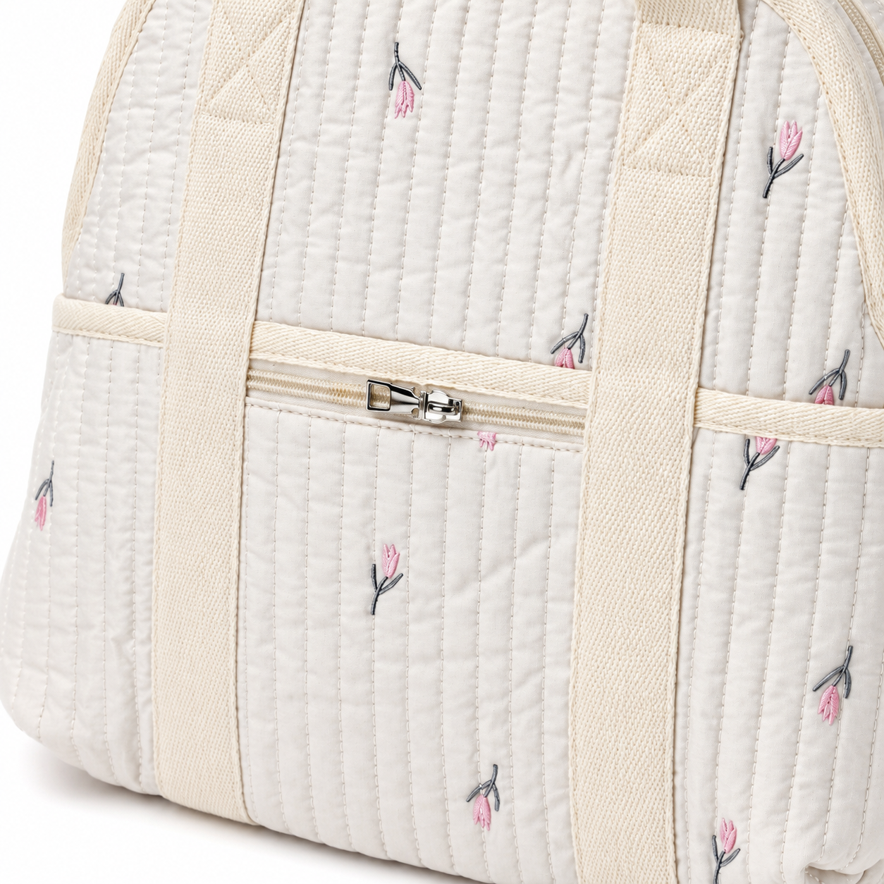 Quilted floral baby diaper backpack fabric and zipper detail
