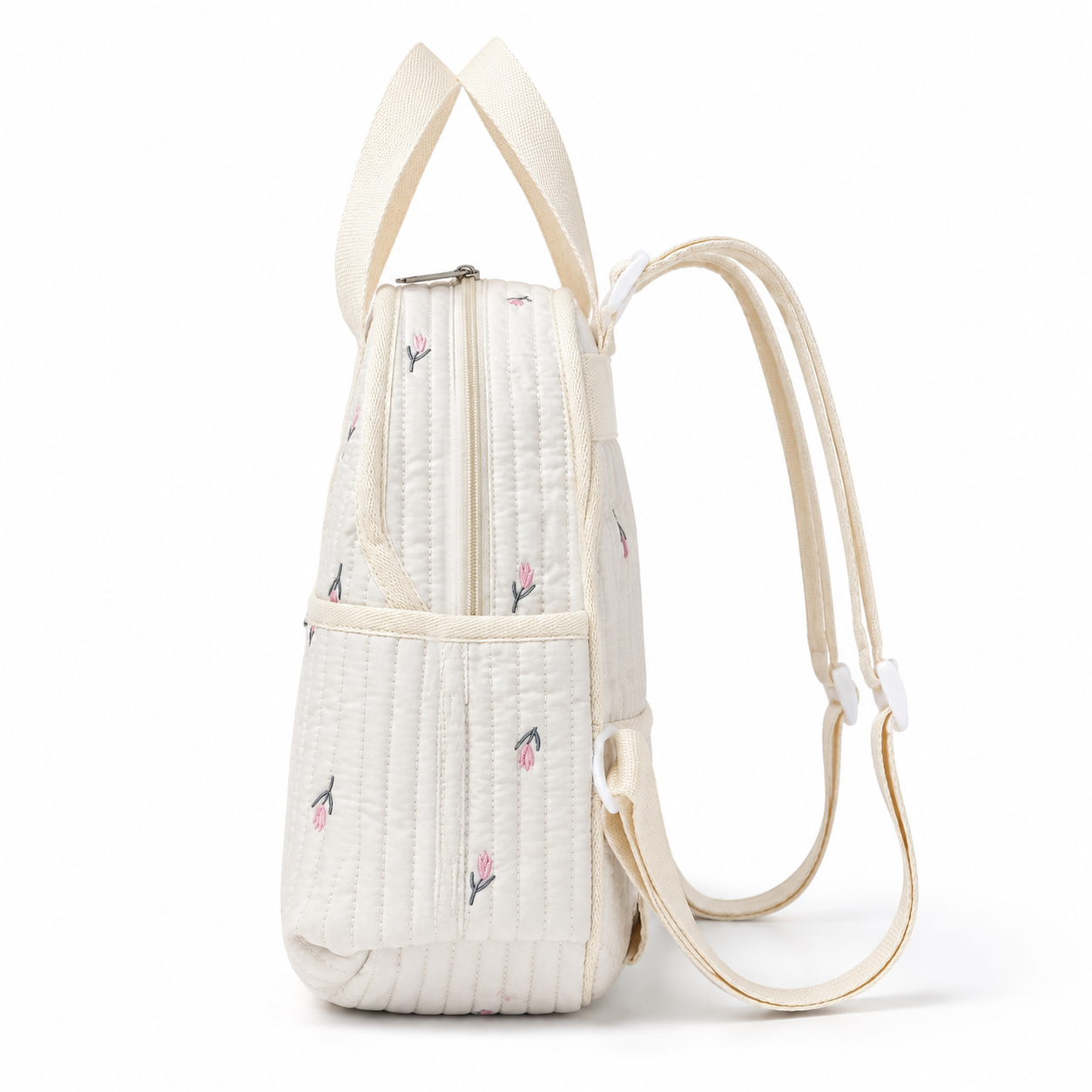 Quilted floral baby diaper backpack side profile
