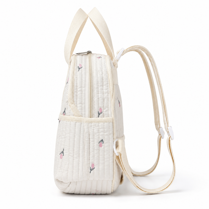 Quilted floral baby diaper backpack side profile