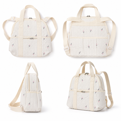 Quilted floral baby diaper backpack multiple view product set