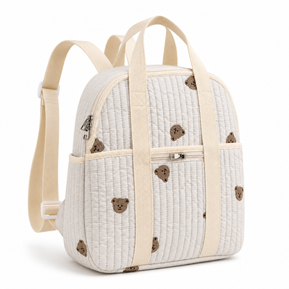 Quilted teddy bear baby diaper backpack front angle with cream straps